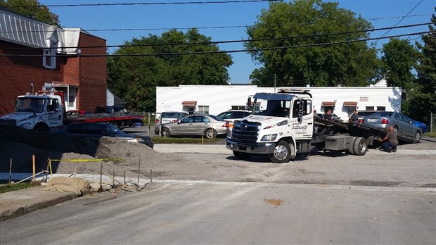 Stationnement au centre-ville: des propriétaires prennent les grands moyens