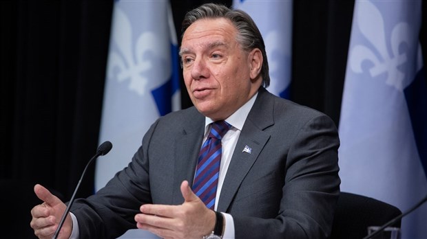 Zones rouges: encore 4 semaines de mesures sanitaires imposées, annonce Legault